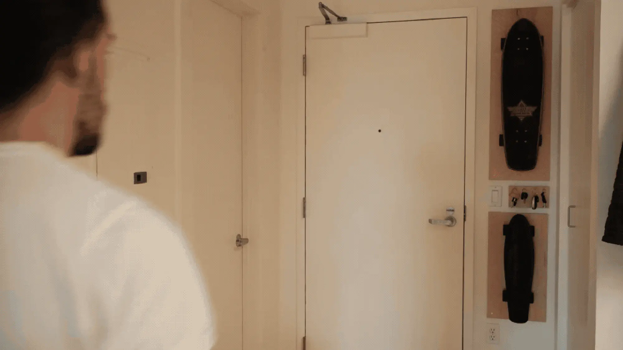 Video of James grabbing keys and a skateboard and walking out the
door